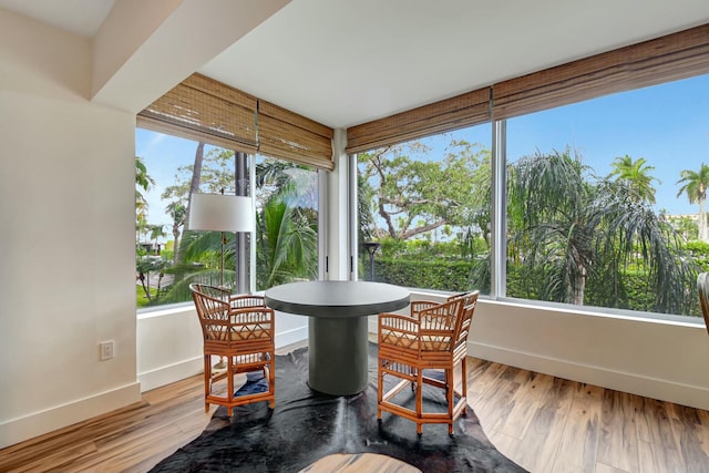 dining area featuring light wood-type flooring