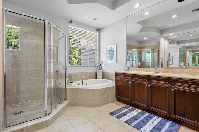 bathroom with vanity, separate shower and tub, and tile patterned flooring