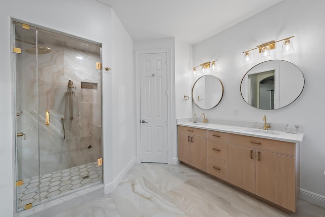 bathroom featuring vanity and an enclosed shower