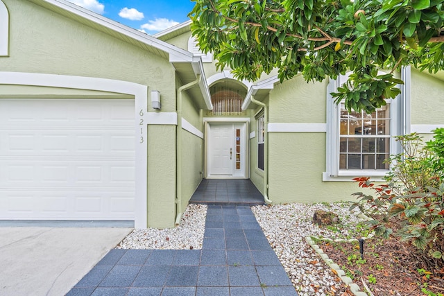 property entrance featuring a garage