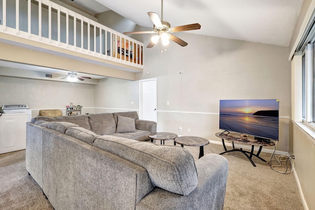 living room featuring washer / dryer, ceiling fan, carpet flooring, and high vaulted ceiling