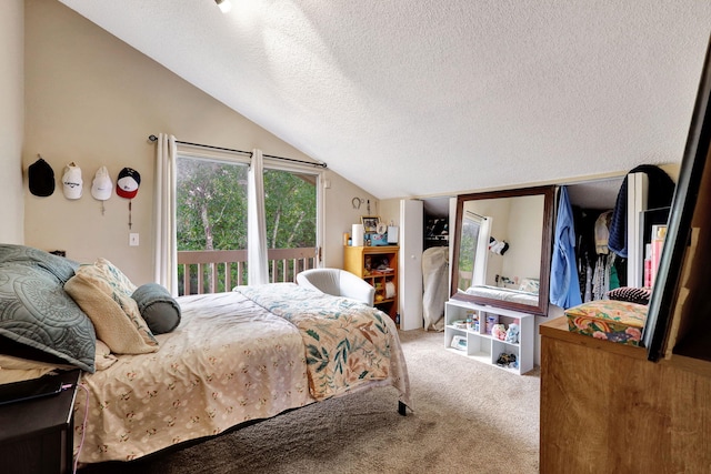 bedroom with carpet flooring, access to exterior, a textured ceiling, and vaulted ceiling