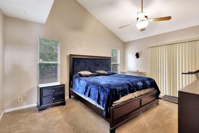 bedroom with high vaulted ceiling, light carpet, and ceiling fan