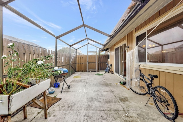 view of patio / terrace with a lanai