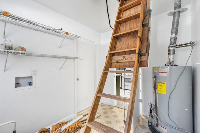 utility room featuring gas water heater