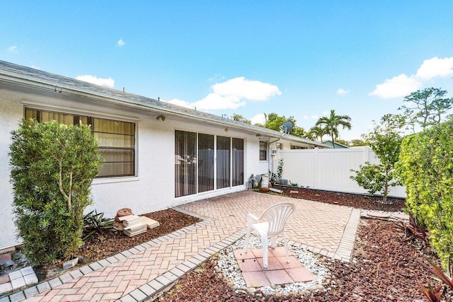 back of house featuring a patio area