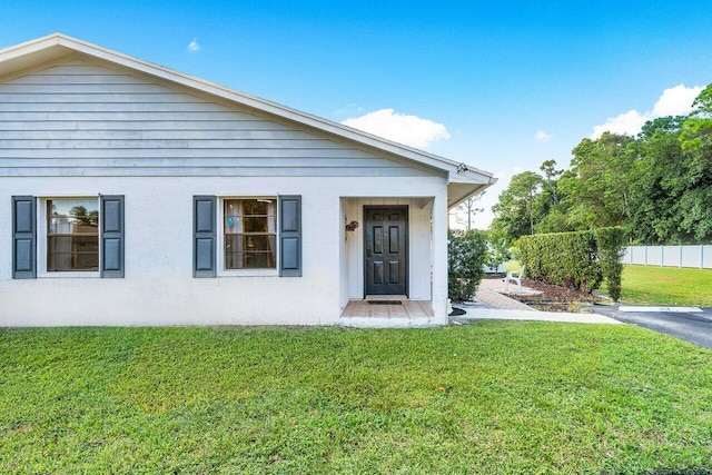 view of front of home with a front yard