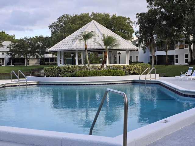 community pool featuring a gazebo