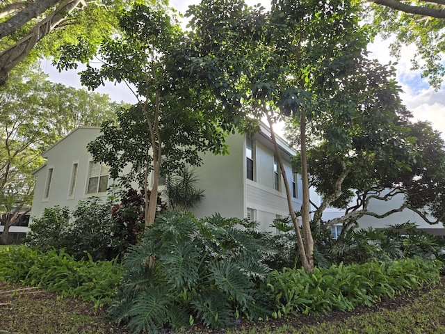 view of home's exterior with stucco siding