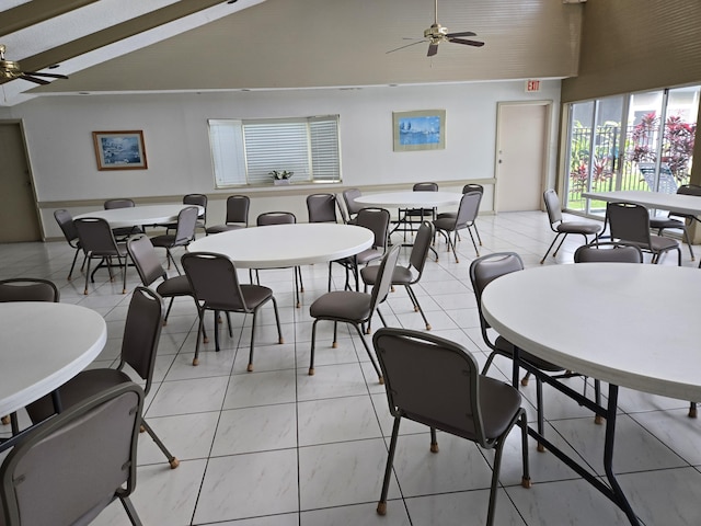 dining room featuring a ceiling fan, high vaulted ceiling, and light tile patterned floors