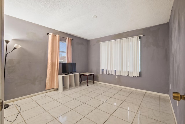 1801 SW Beeker St S, Port Saint Lucie, FL 34953 - empty room with a textured ceiling and baseboards
