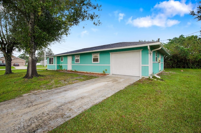 1801 SW Beeker St S, Port Saint Lucie, FL 34953 - view of front of property featuring a garage, concrete driveway, and a front lawn