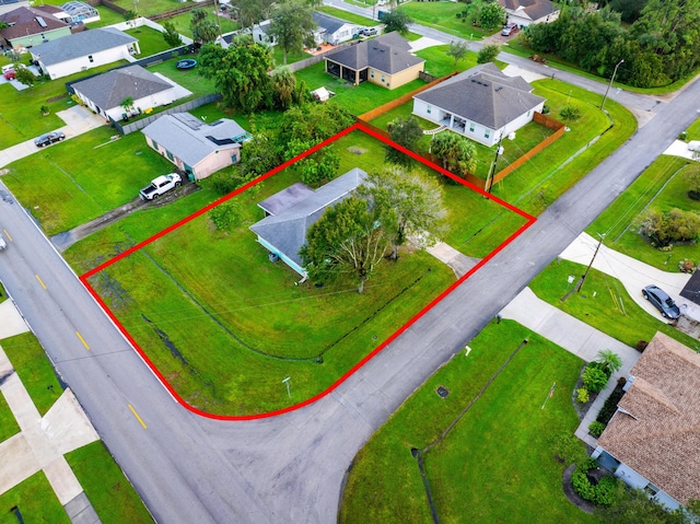 1801 SW Beeker St S, Port Saint Lucie, FL 34953 - aerial view of residential area featuring property parcel outlined