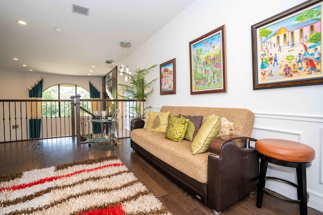 living room featuring dark wood-type flooring