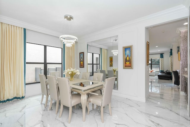 dining area featuring a notable chandelier and ornamental molding