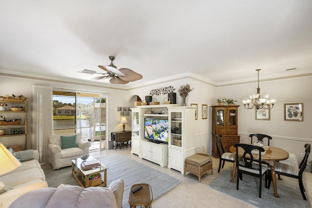 living room featuring light tile patterned floors, ceiling fan with notable chandelier, and ornamental molding