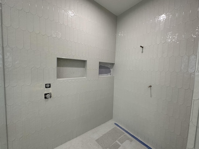 washroom with tile patterned flooring