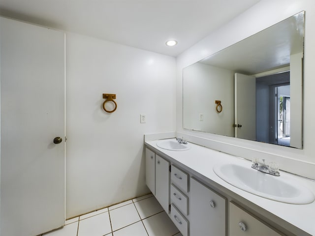 bathroom with vanity and tile patterned floors