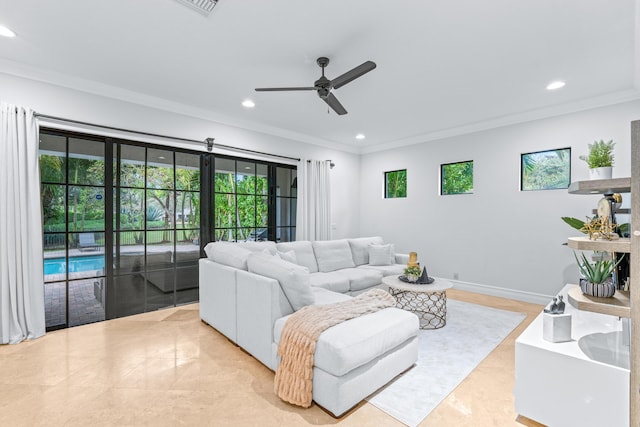 tiled living room with ceiling fan and crown molding