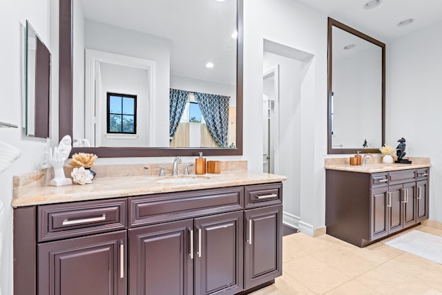 bathroom with vanity and tile patterned floors