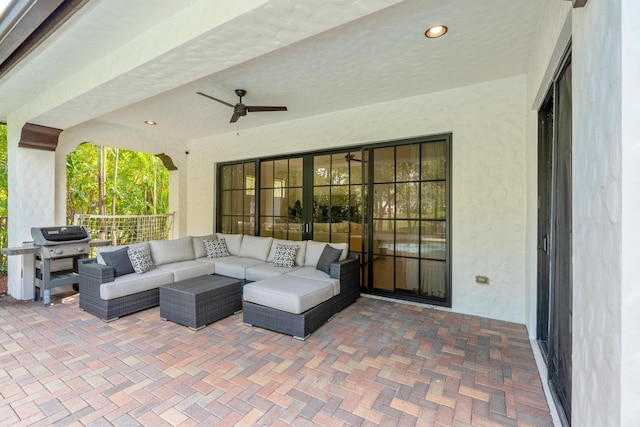 view of patio / terrace featuring a grill, outdoor lounge area, and ceiling fan