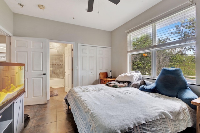 bedroom with tile patterned floors, ceiling fan, a closet, and multiple windows