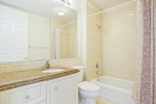 full bathroom with tile patterned floors, a textured ceiling, toilet, shower / bath combo with shower curtain, and vanity