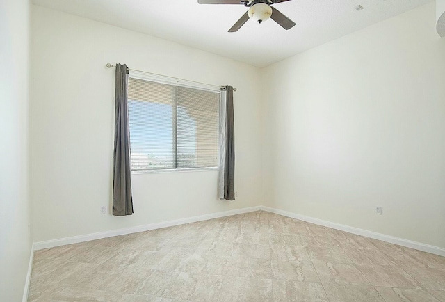 spare room featuring ceiling fan