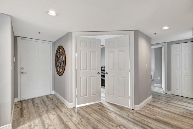 entrance foyer featuring light hardwood / wood-style floors