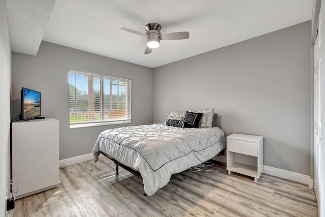 bedroom featuring ceiling fan and light wood-type flooring