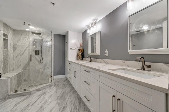 bathroom with vanity and walk in shower