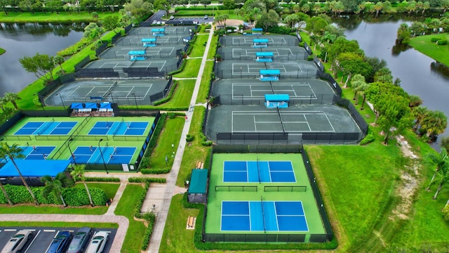 birds eye view of property featuring a water view