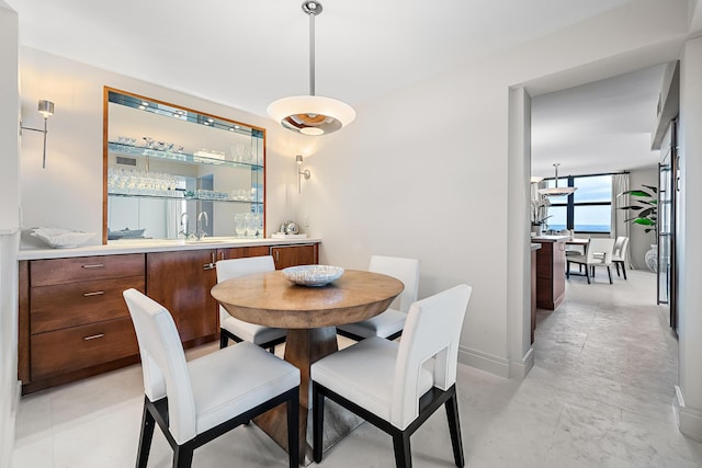 dining room featuring sink