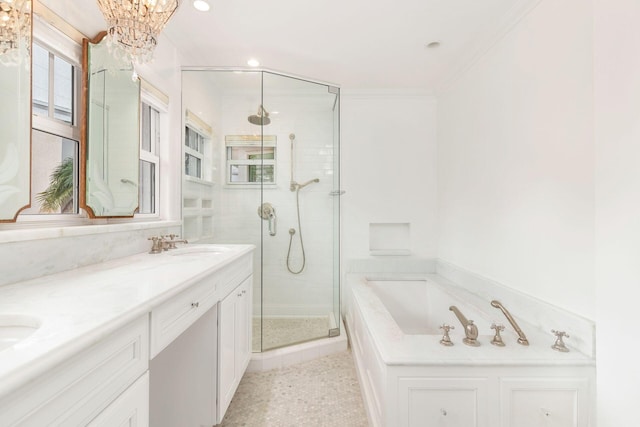 bathroom featuring vanity, crown molding, tile patterned flooring, shower with separate bathtub, and a chandelier