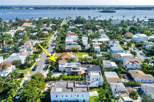 drone / aerial view with a water view