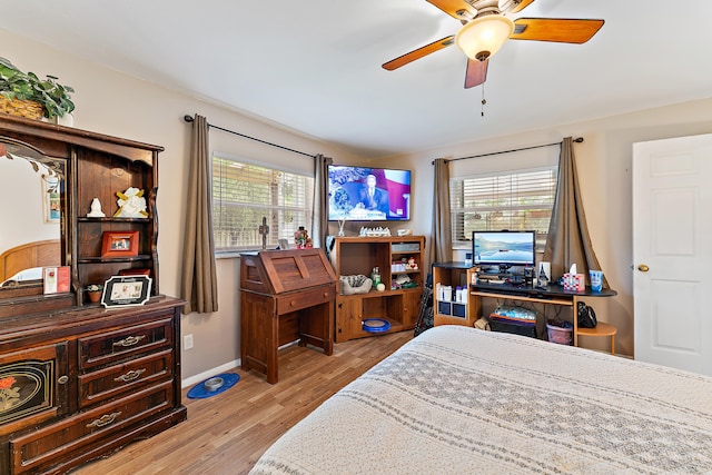 bedroom featuring ceiling fan and light hardwood / wood-style floors