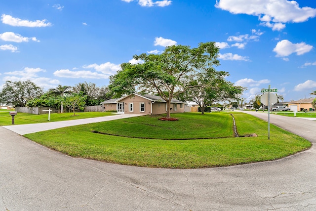 view of front of home with a front lawn