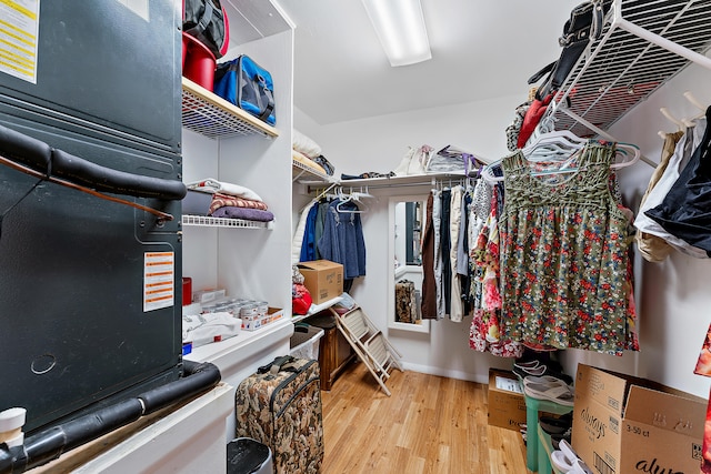 walk in closet featuring hardwood / wood-style floors