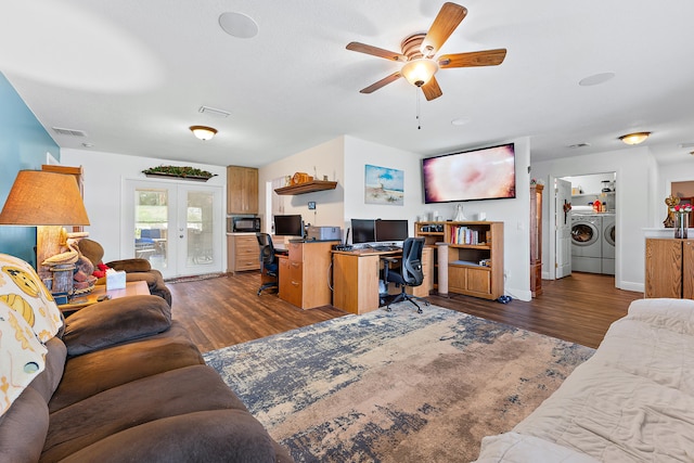 office space featuring ceiling fan, french doors, dark hardwood / wood-style floors, and separate washer and dryer