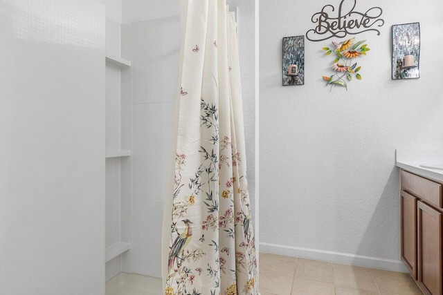 bathroom featuring a shower with curtain and vanity