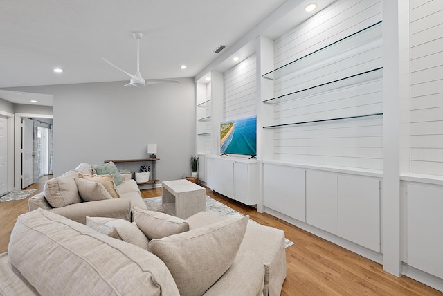 living area featuring recessed lighting, light wood-type flooring, visible vents, and a ceiling fan