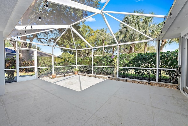 view of patio / terrace with a lanai