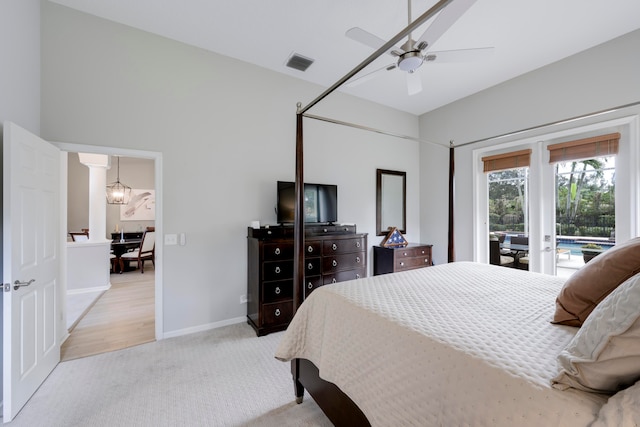 bedroom featuring access to exterior, ceiling fan, and light carpet