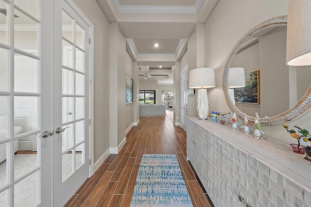 hallway featuring french doors, dark hardwood / wood-style floors, and ornamental molding