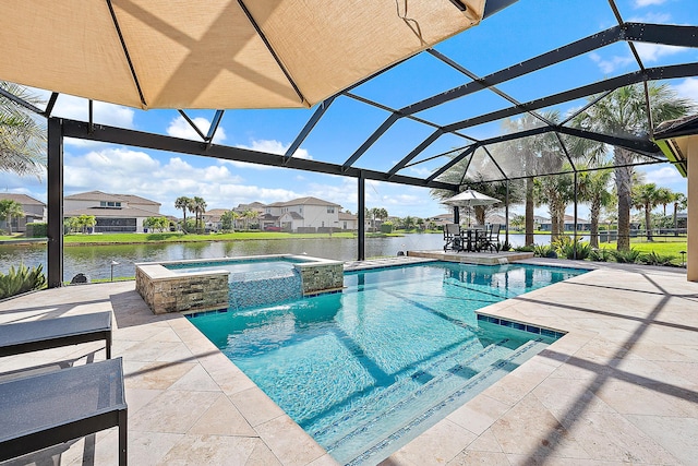 view of pool with a lanai, an in ground hot tub, a water view, and a patio