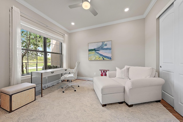 office featuring ceiling fan and crown molding