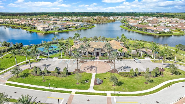 drone / aerial view with a water view