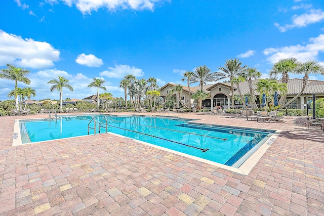 view of swimming pool featuring a patio area