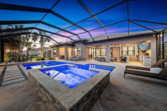 view of pool with glass enclosure, an outdoor living space, an in ground hot tub, area for grilling, and a patio