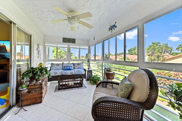 sunroom / solarium with ceiling fan